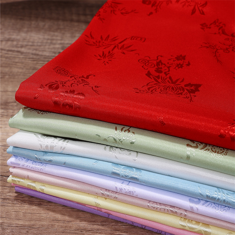 梅兰竹菊提花丝绸布料服装面料