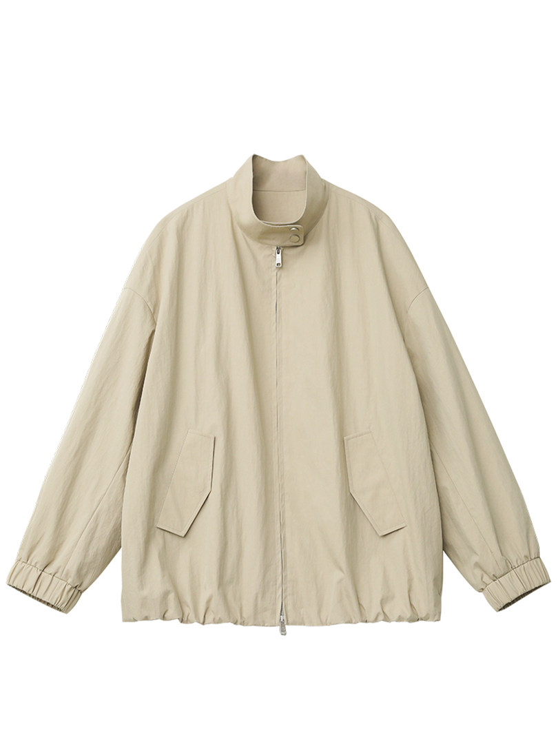 Beige lightweight zip-up jacket laid flat on a white background