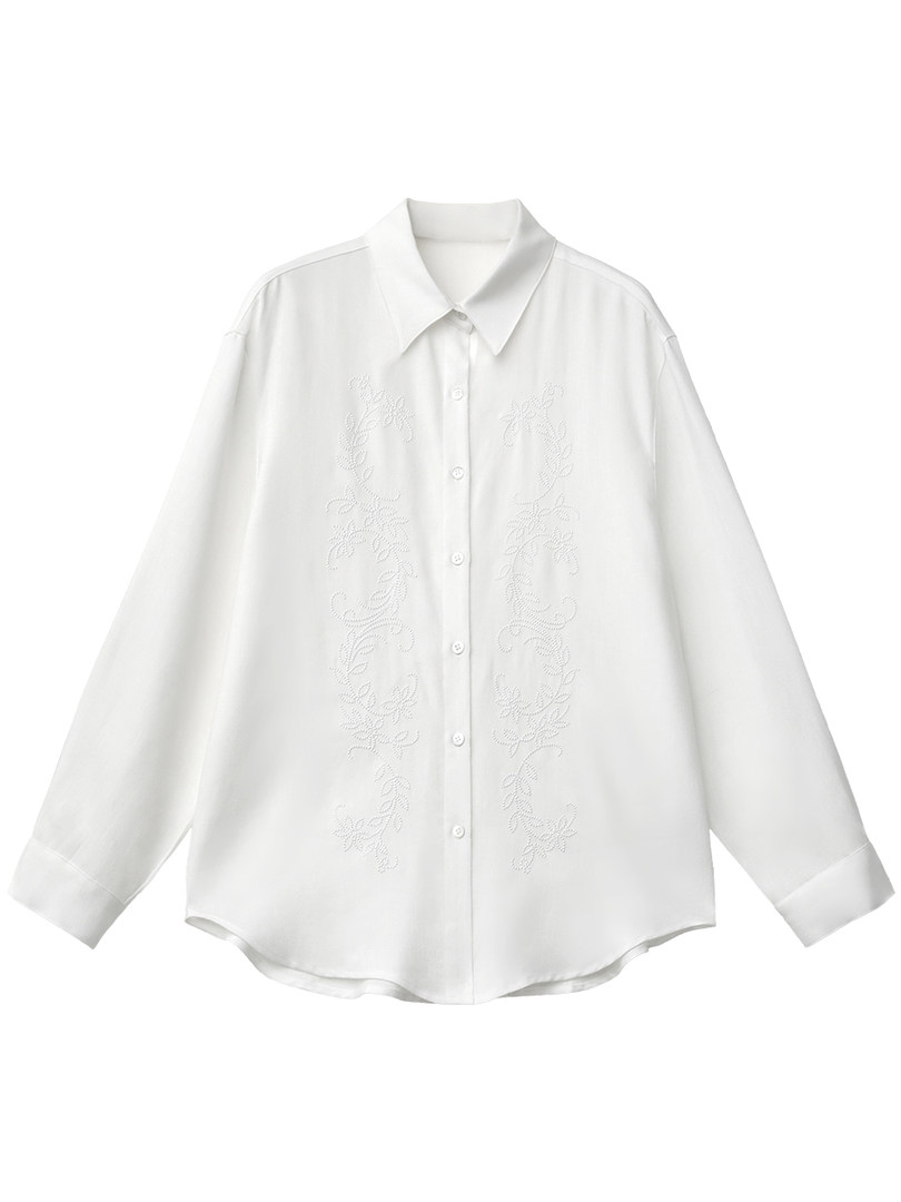 White long-sleeve button-up shirt with delicate embroidery on a plain background