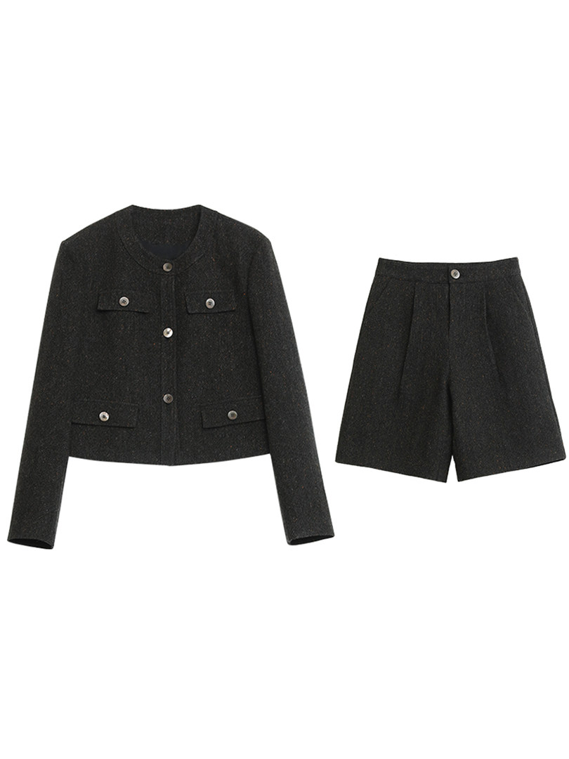 Black tailored jacket and matching shorts laid flat on a white background