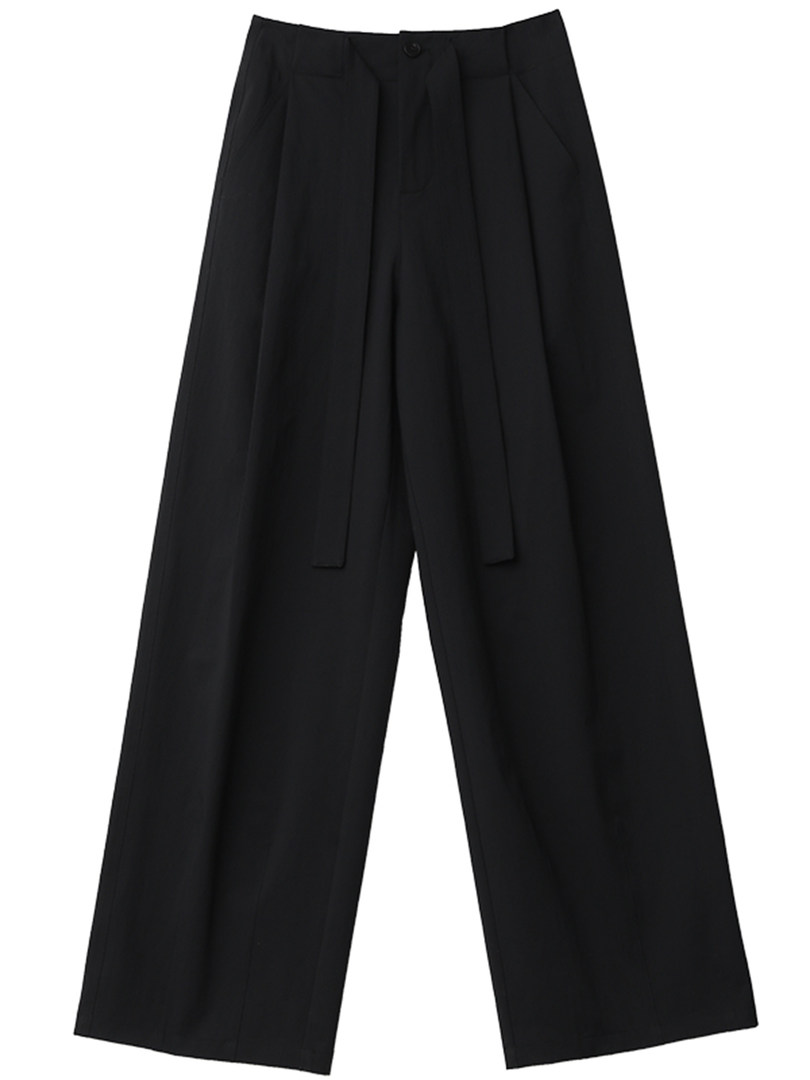 Black wide-leg trousers laid flat on a white background