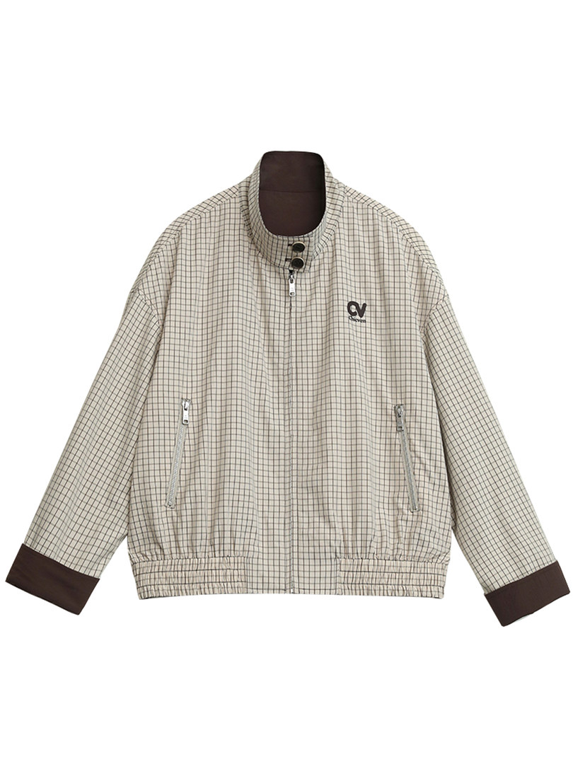 Beige checkered zip-up jacket with brown trim on a white background