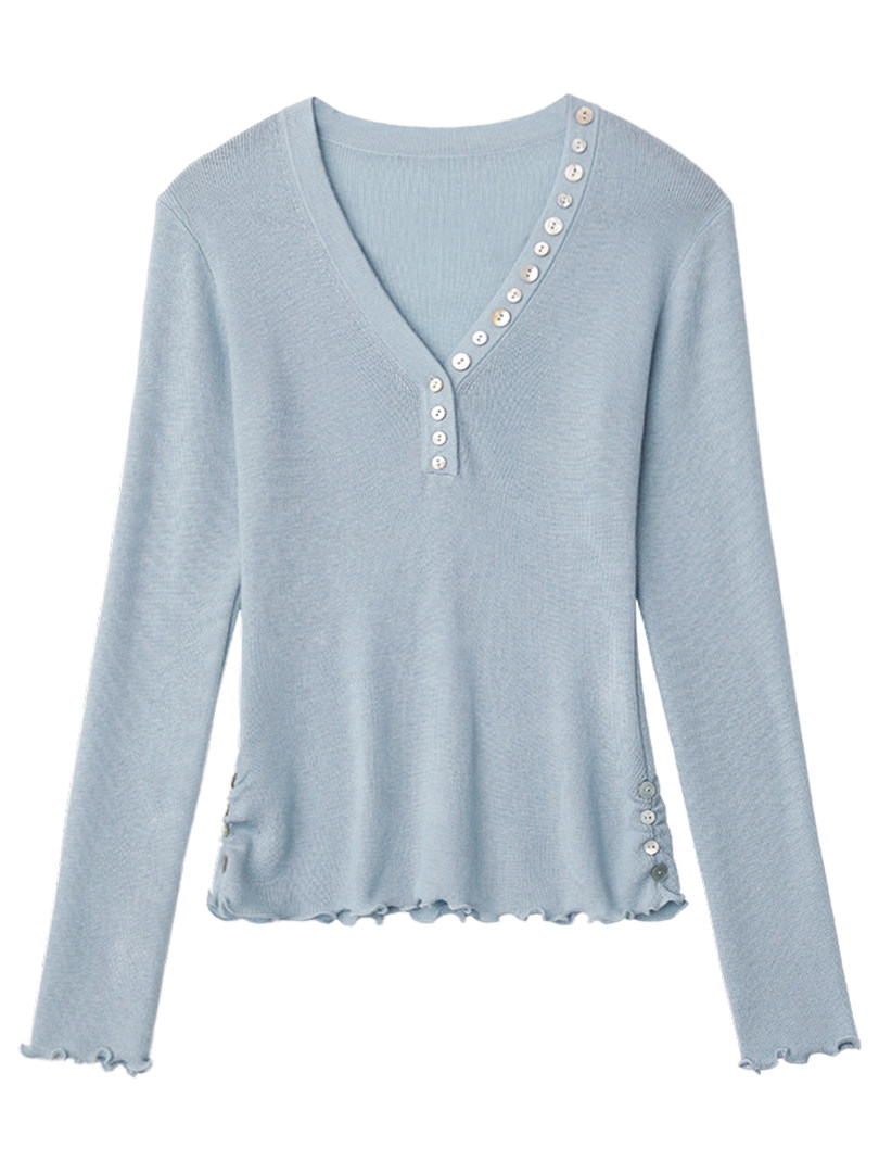 Light blue long-sleeve button-front knit top on a white background