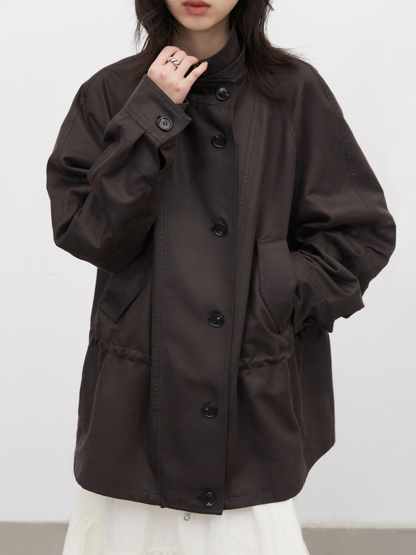 Dark brown button-up jacket worn by a model