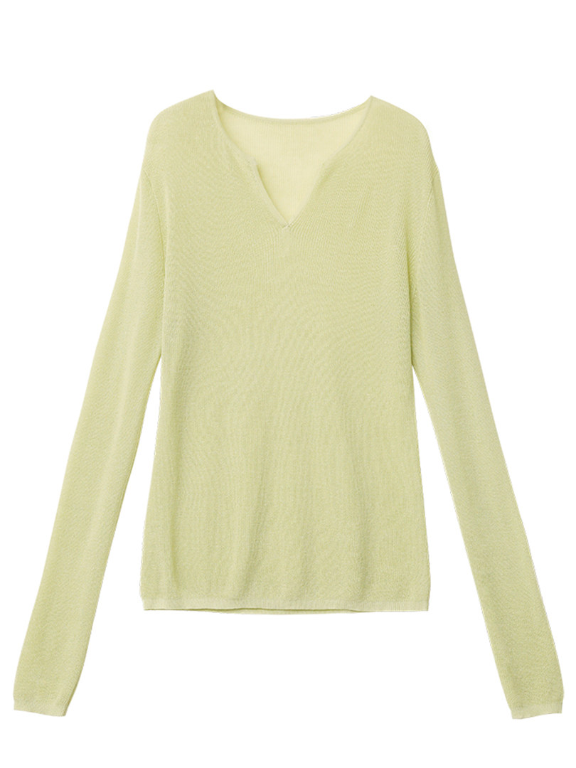 Light yellow long-sleeve knit sweater laid flat on a white background