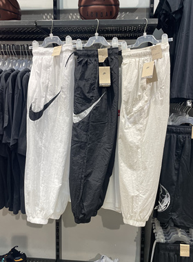 Nike耐克 春夏女子运动休闲潮流大勾速干梭织薄款束脚长裤 DM6184
