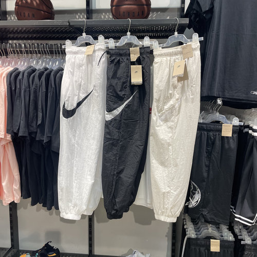 Nike耐克 春夏女子运动休闲潮流大勾速干梭织薄款束脚长裤 DM6184