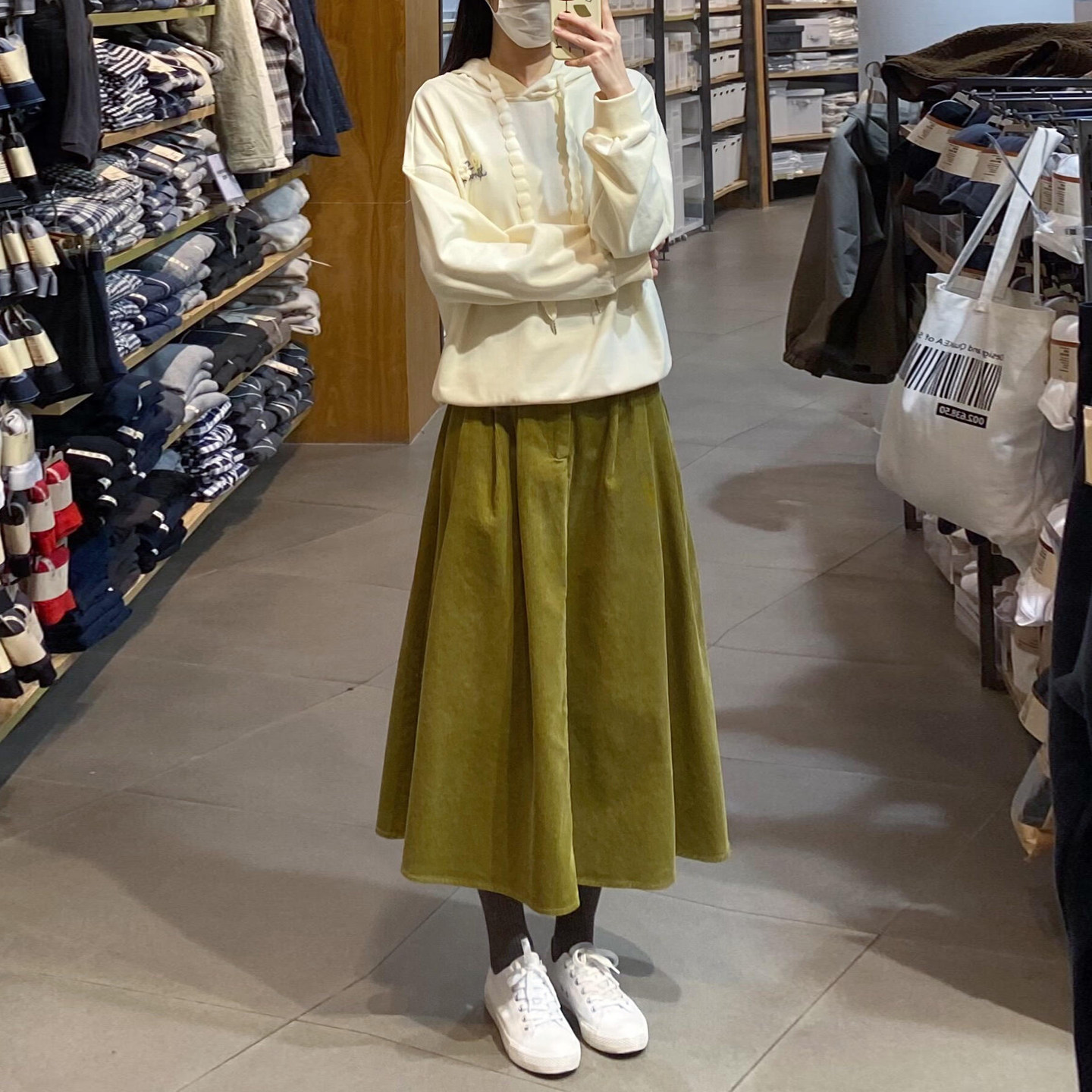 芥末绿灯芯绒半身裙女复古文艺中长款遮胯显瘦a字裙日式口袋伞裙