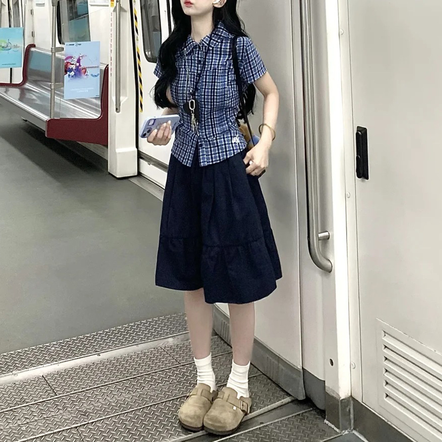 墨蓝色短裙女日系学院风高腰a字裙设计感小众压褶藏蓝色中裙伞裙