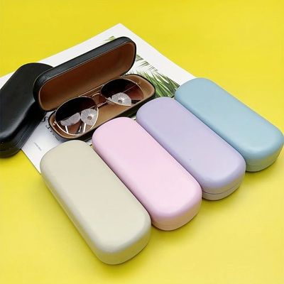 A stylish hard glasses case with sturdy snap closure and sof