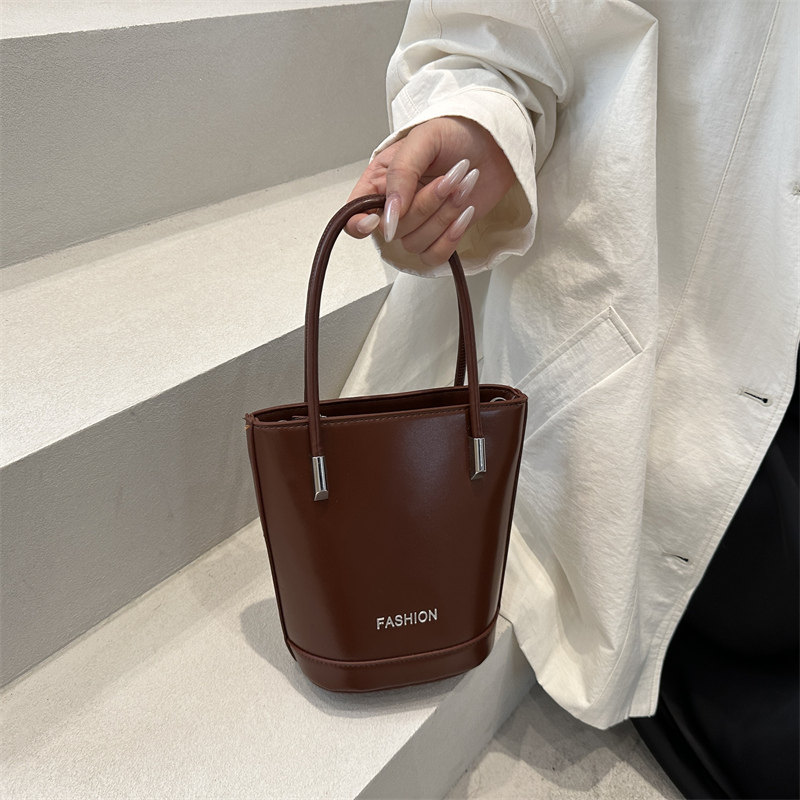 高级感小众包包女夏天2025新款百搭斜挎包韩系休闲爆款手提水桶包,箱包皮具/热销女包/男包,水桶包,淘宝优惠券,粉丝福利购,淘宝优惠卷