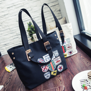 2025新帆布百搭休闲防水牛津布徽章手提旅行袋女单肩健身电脑大包