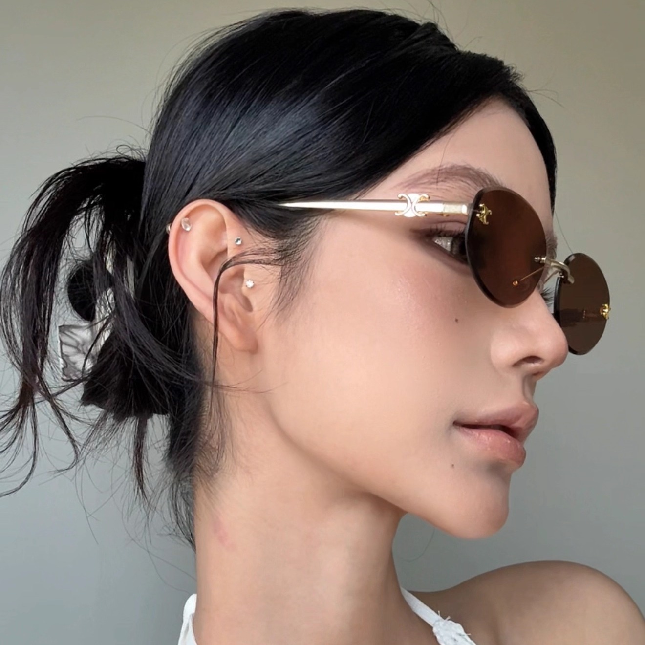 弗瑞姆椭圆框金属无框太阳镜