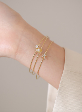新款时尚镀黄金手镯小众设计简约珍珠星星镯子闺蜜手链个性手环