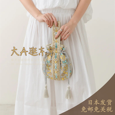 大A逛东京ne quittez pas日本代购 花朵刺绣流苏手提袋