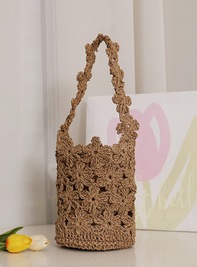 时尚手工钩织花朵单肩水桶草编包新款镂空编织包女海边度假沙滩包