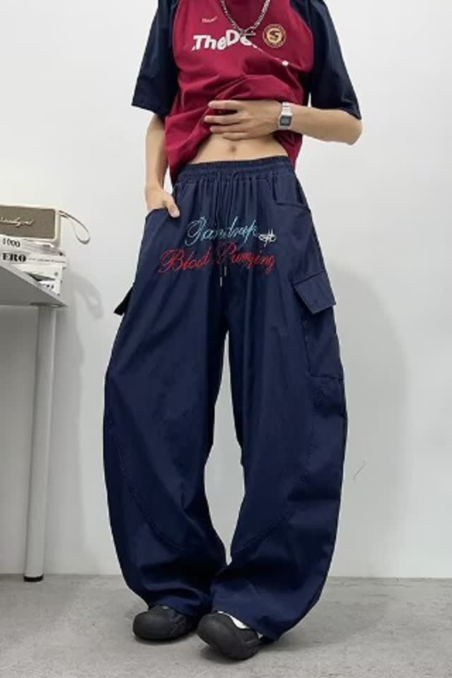字母刺绣弯刀阔腿裤男女夏季宽松褶皱速干街舞休闲长裤K8036P45图片