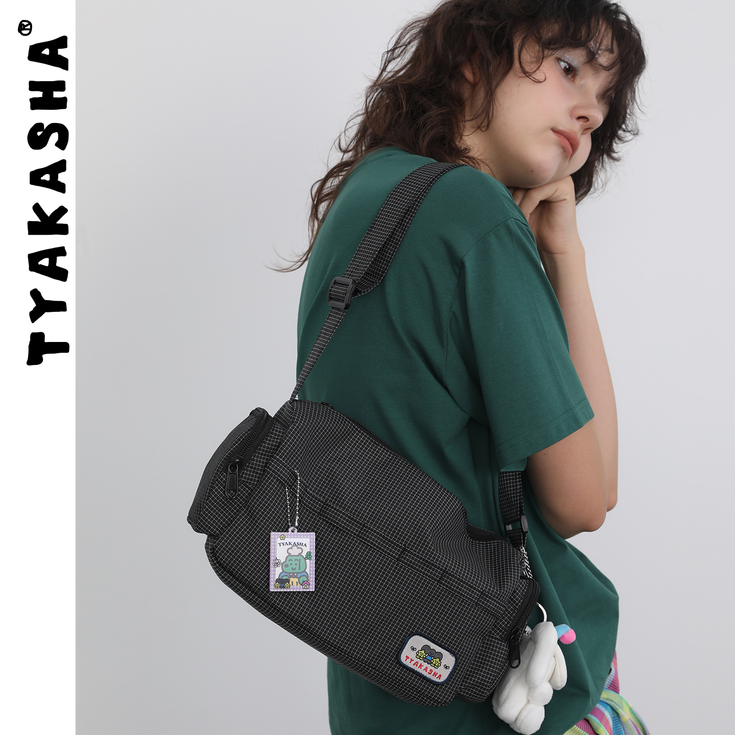 TYAKASHA塔卡沙包2025秋季新款黑色可调节单肩包斜挎包