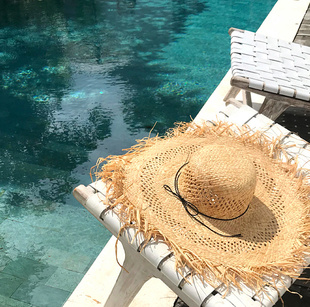 流苏毛边镂空大帽檐天然拉菲草帽造型拍照个性度假海边编织沙滩帽