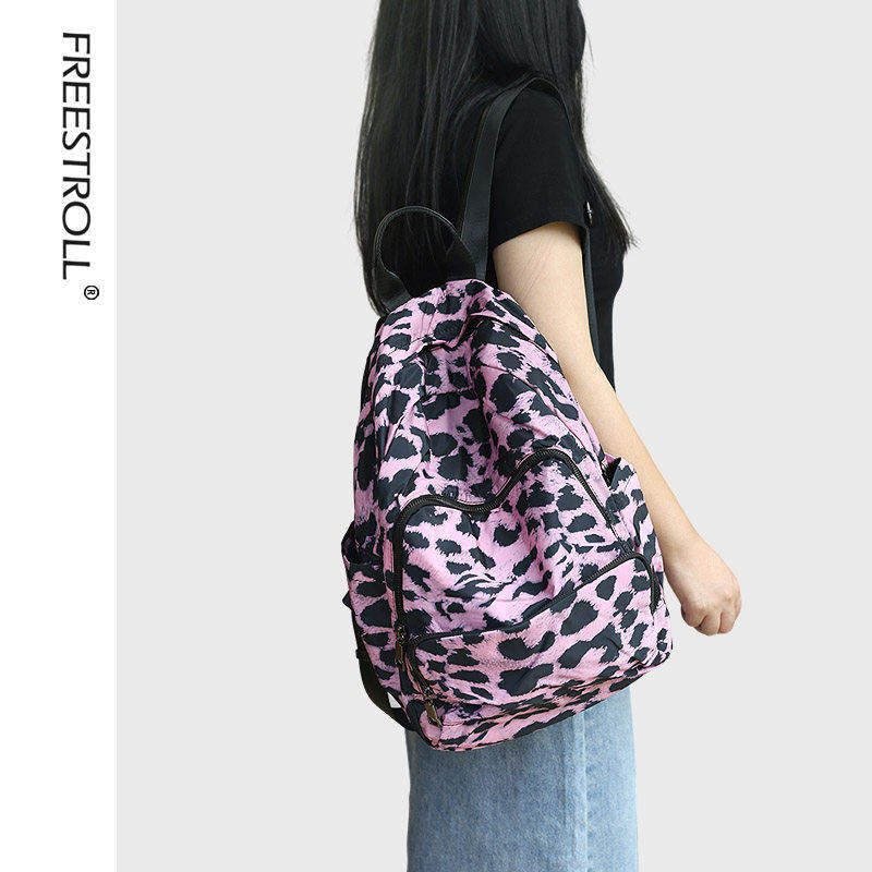 很轻便时尚个性彩色双肩包布女旅行背包书包大容量豹纹旅游防水