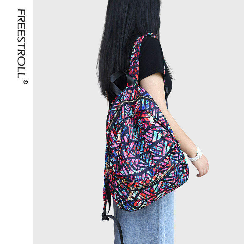 时尚个性彩色布包双肩包大学生书包女轻便大容量旅行背包旅游秋天