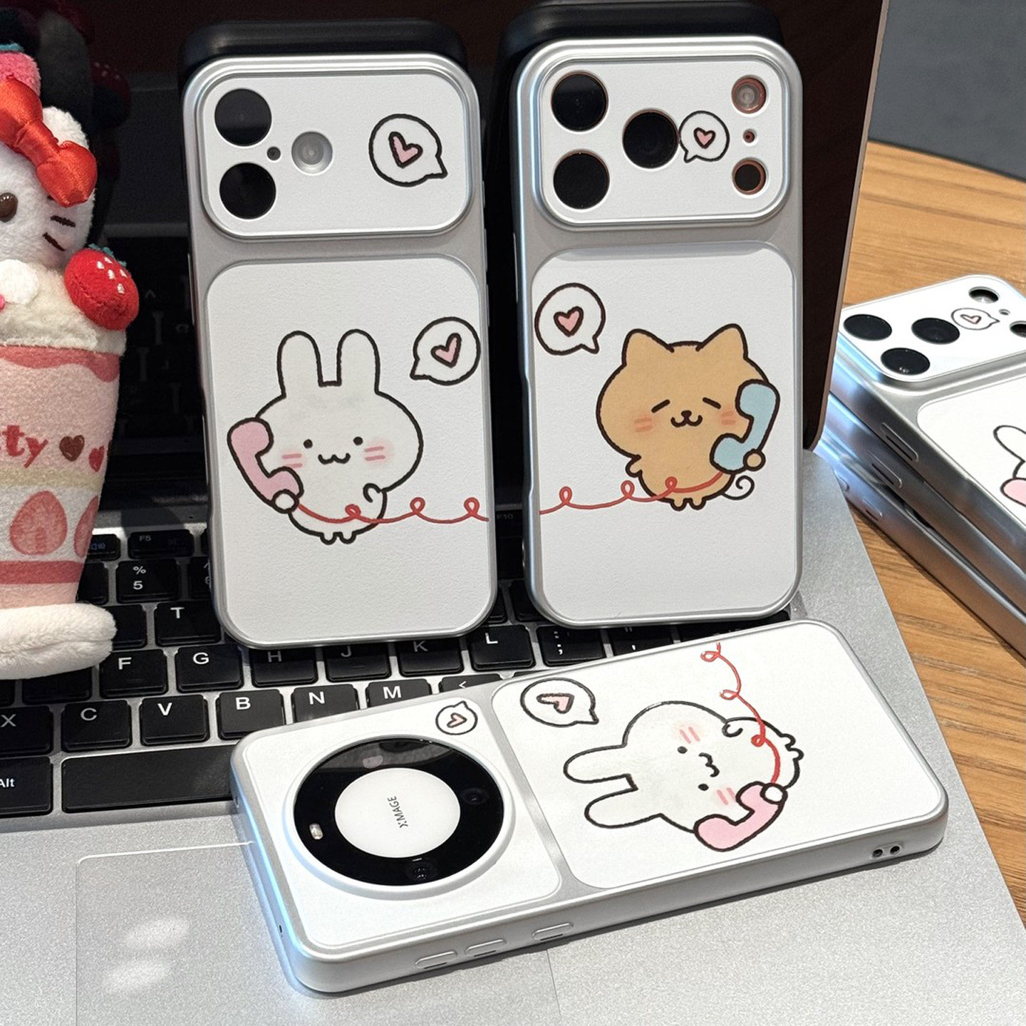 情侣可爱打电话兔子猫咪适用苹果17pro手机壳iPhone18max小米17华为mate80pura70K90nova16note15荣耀600x300
