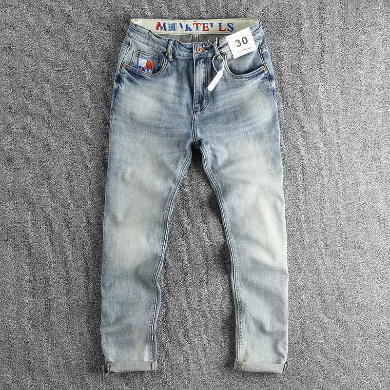 复古磨白做旧水洗猫须牛仔裤