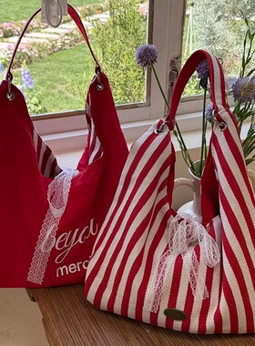 新款大容量条纹单肩时尚女包简约慵懒托特通勤百搭休闲帆布包双面