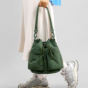 春节不打烊束口水桶包女式手提单肩斜挎IPADMINI伞逛街便携小背包