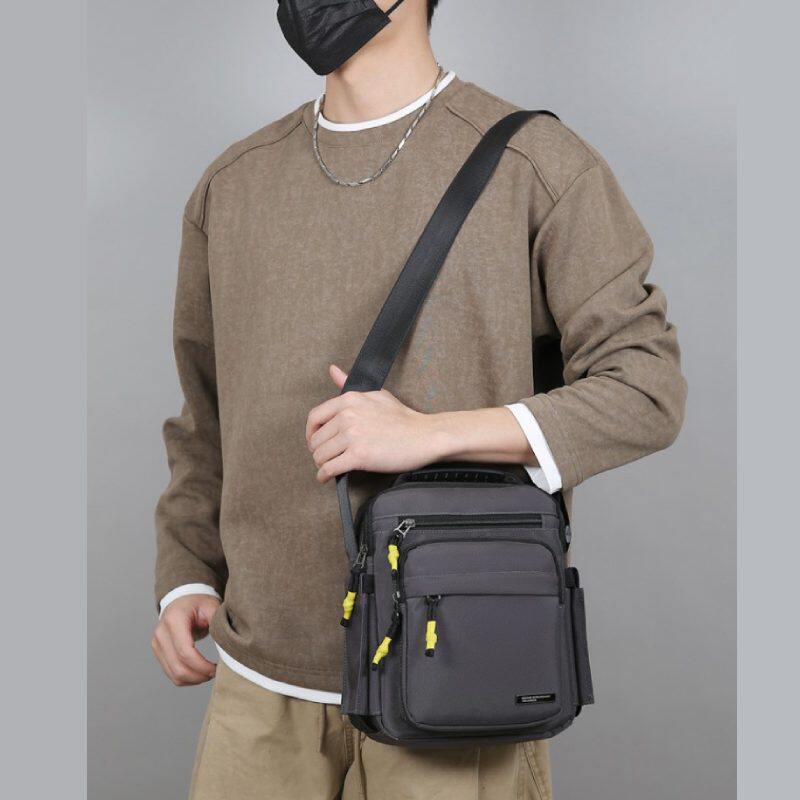 2026双侧6.7厘米直径水杯位男式手提单肩斜挎9.7寸平板伞爸爸背包