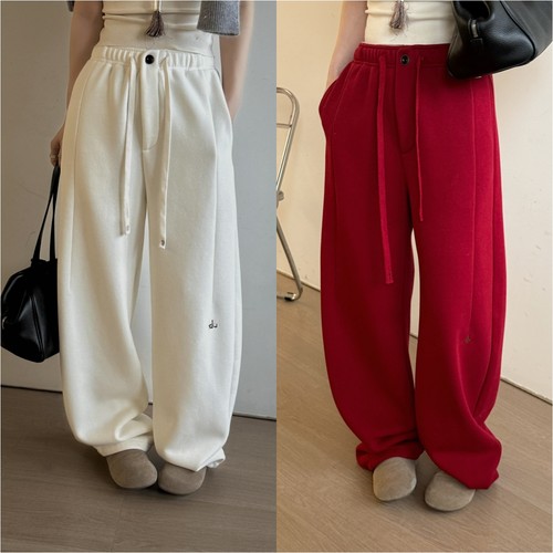 欧洲站2025冬季慵懒风松紧腰一粒扣系带弯刀裤宽松立体剪裁休闲裤