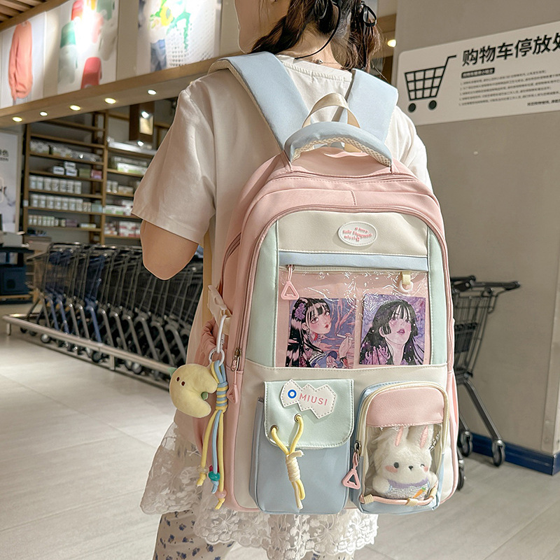 森系ins新款高颜值清新甜美透明吧唧痛包初高中生轻便旅行双肩包