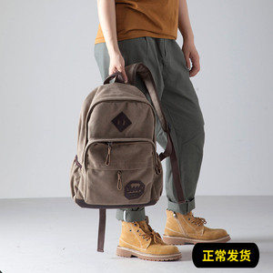 韩版男女背包休闲双肩包男时尚潮流帆布男女旅行包电脑包学生书包