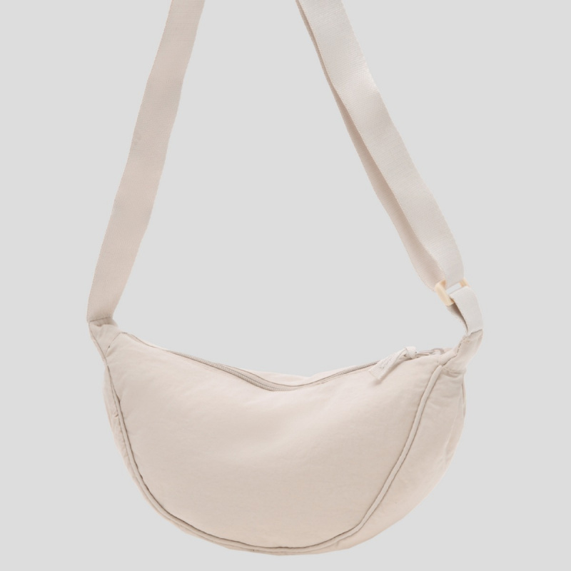 日系秋季新款女单肩斜挎腋下月牙