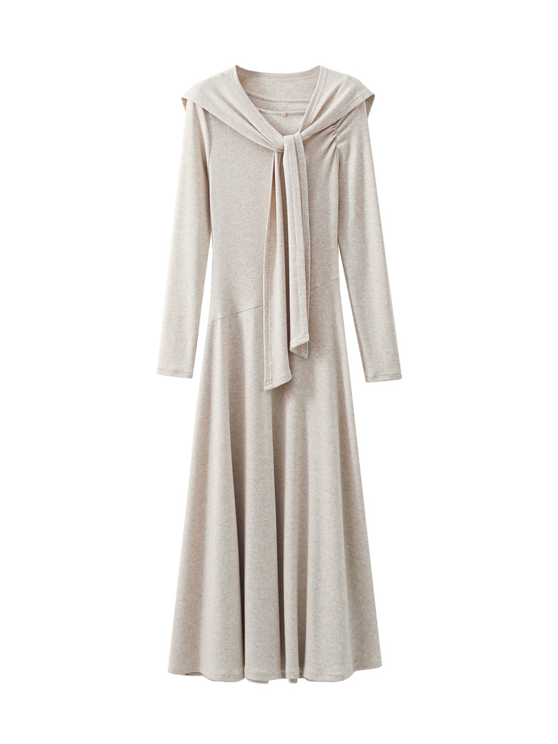 Beige long-sleeve knit dress with a tied neckline on a white background