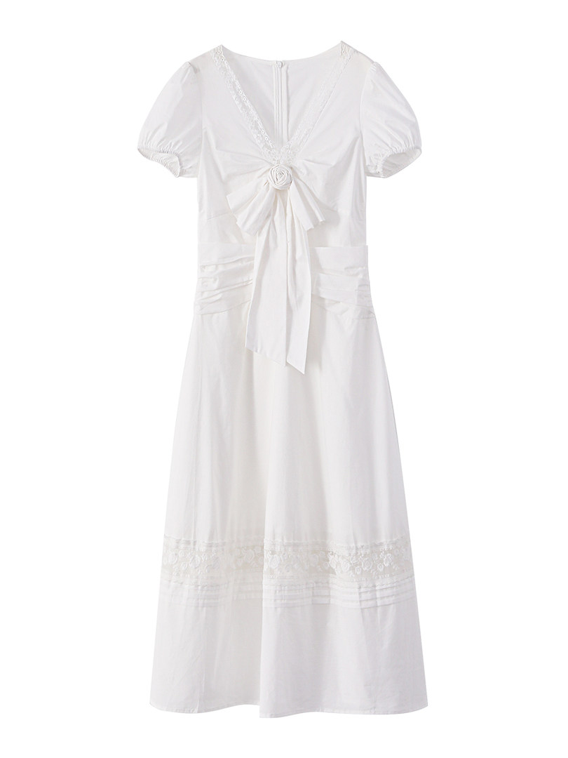 White puff-sleeve midi dress with a bow detail and lace trim