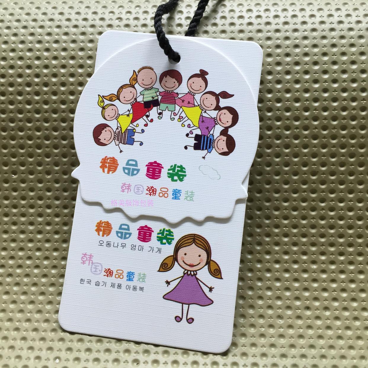 童装莱尼纹铜版纸吊牌定做 女童服装商标挂牌压纹路吊牌订制图片