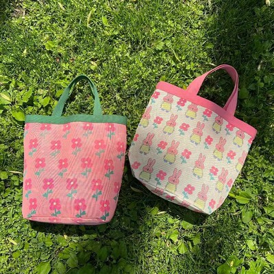 粉色网眼轻便手提妈咪包