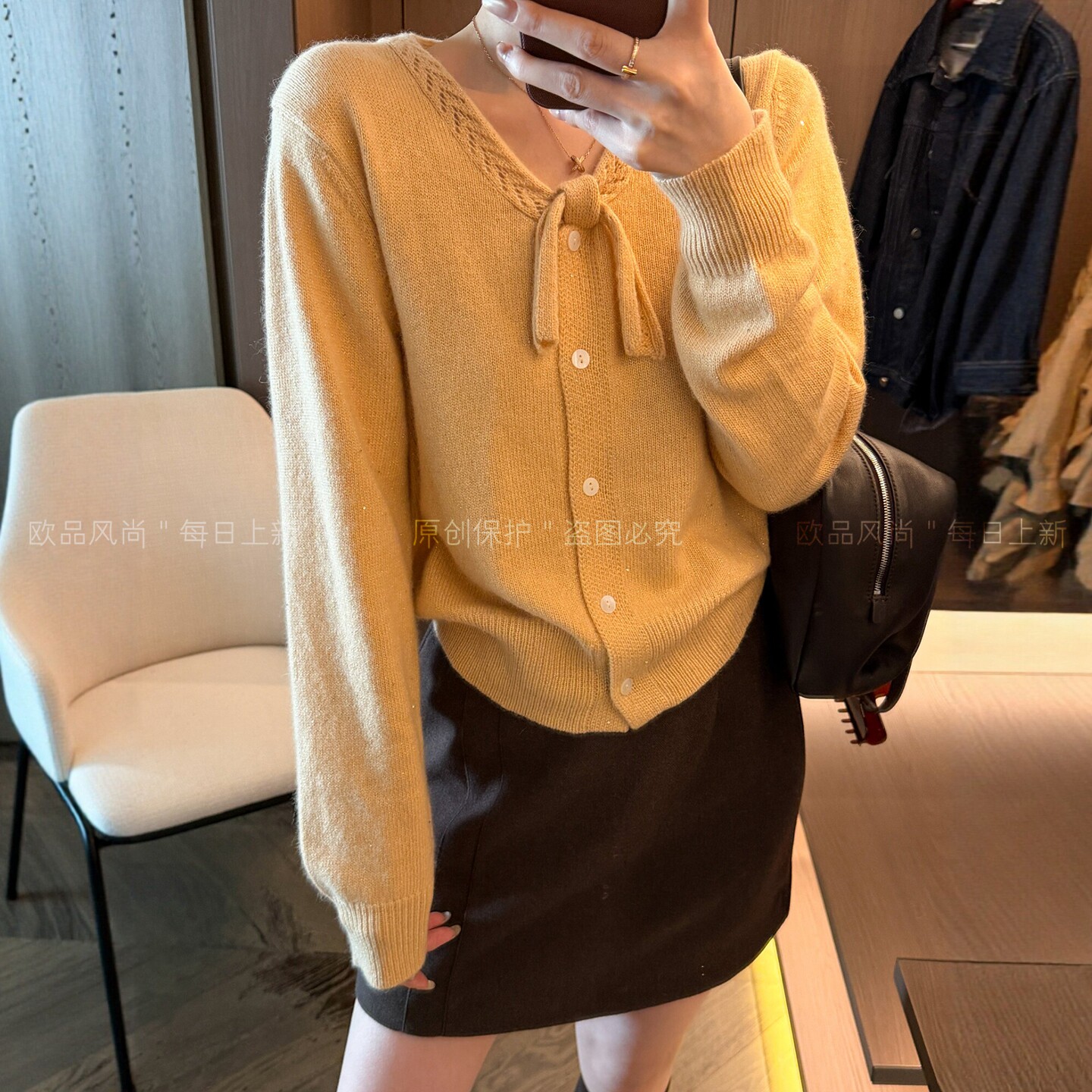蝴蝶结绵羊毛针织开衫女欧货毛衣