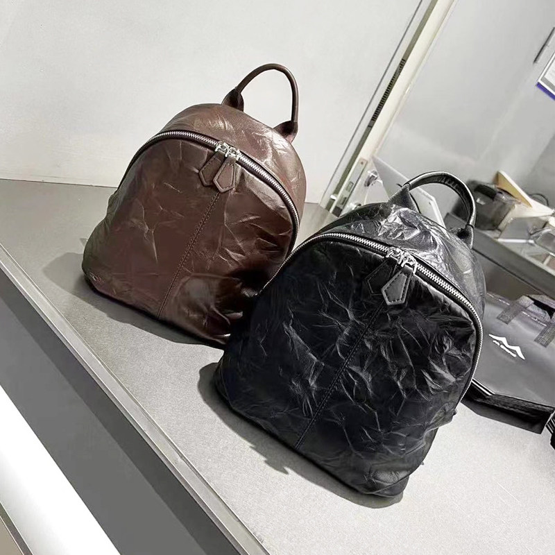 休闲女双肩包手抓纹真皮背包