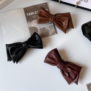原创秋冬发饰女法式 仿皮质香蕉夹高级感蝴蝶结发夹竖夹马尾夹发卡