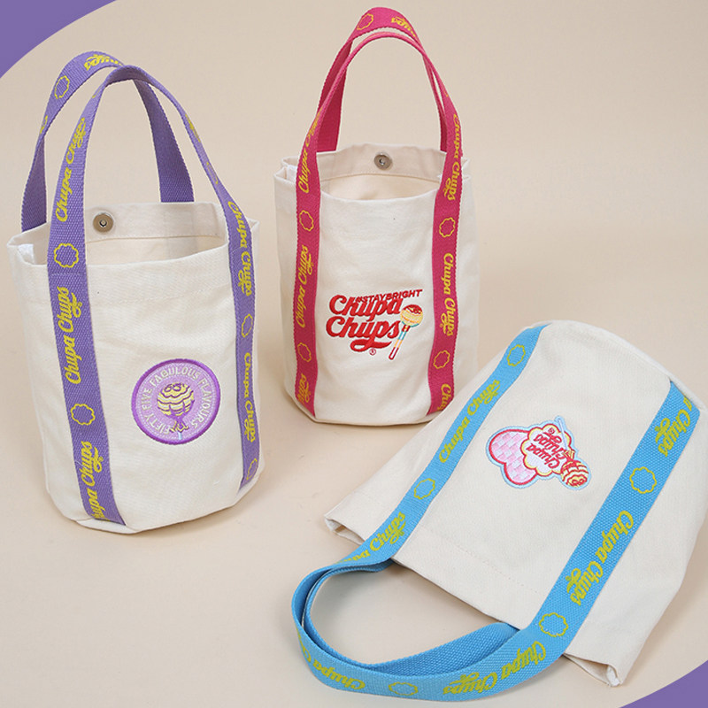 珍宝珠印花肩带刺绣水桶包帆布包可爱大学生小众便携手拎包百搭