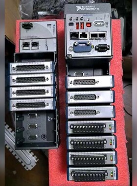 出一套NI CRIO-9038机箱由多个灰色金属箱体组成 议价