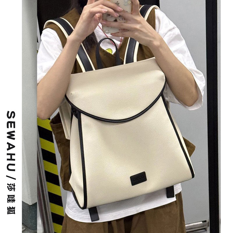 简约双肩包女2025新款设计感小众旅行背包大学生上班通勤电脑书包