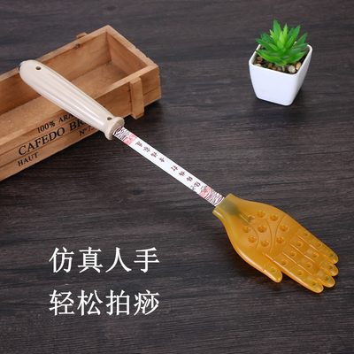 扣痧养生硅胶拍排沙小黄手按摩器