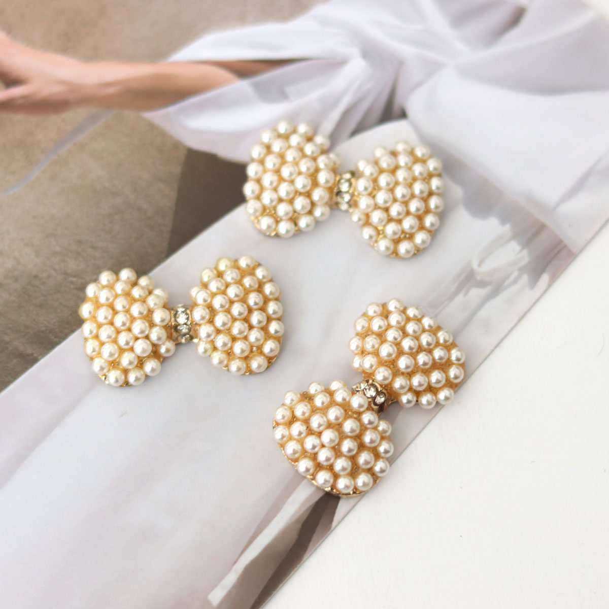 珍珠蝴蝶结合金花朵饰品配件金底手工头饰包包等饰品配件