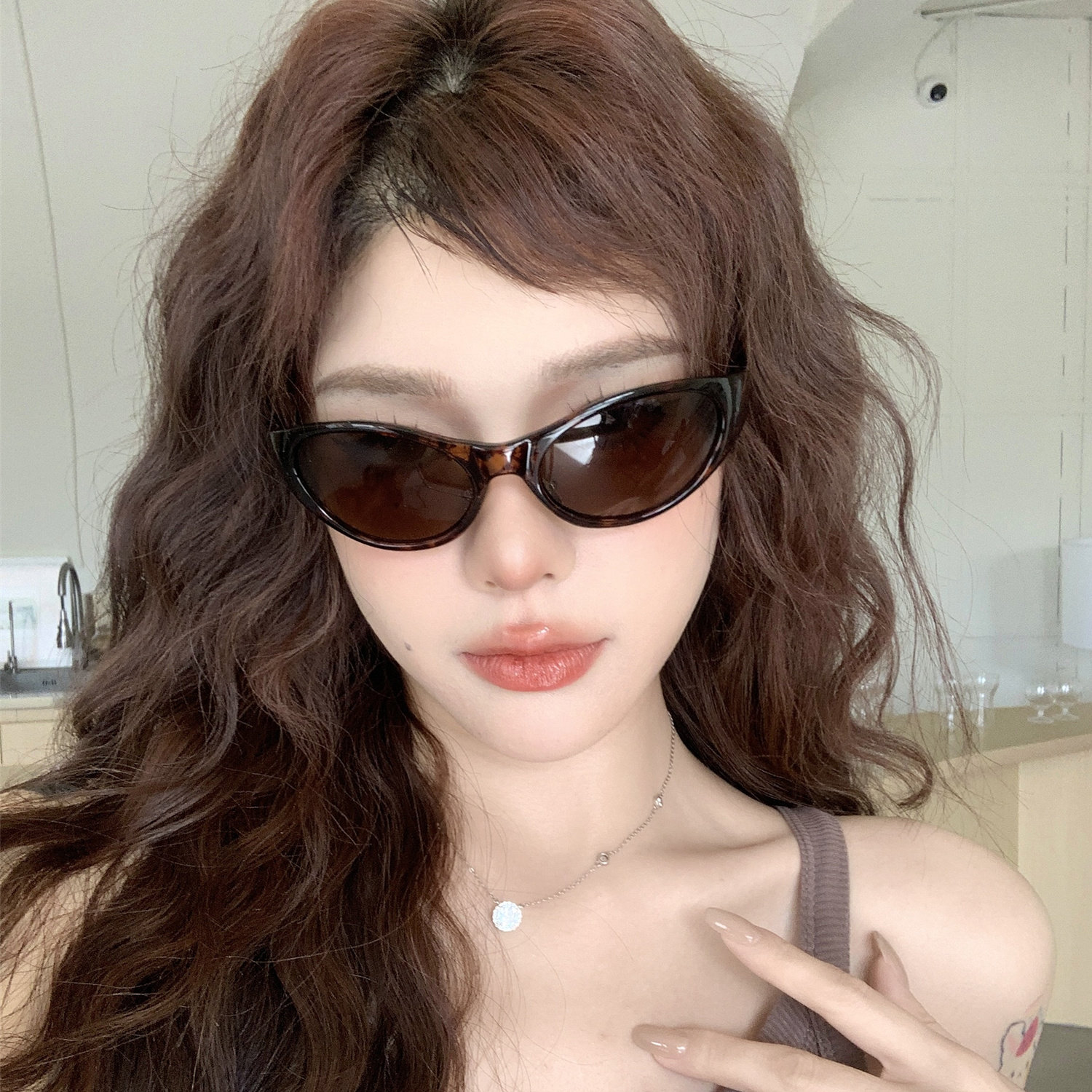 韩版时髦弧形豹纹骑行墨镜男女款高级感户外活动防紫外线太阳眼镜