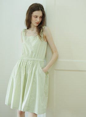 淡绿色气质纯棉吊带连衣裙女2026夏新款度假风肩带装饰口袋长裙子