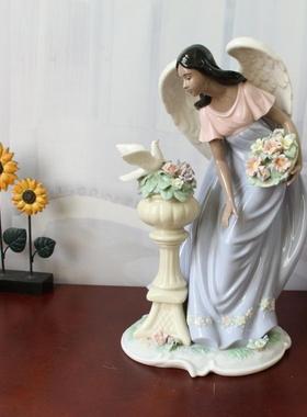 外贸出口西班牙雅致高温陶瓷花园捧花和平鸽天使女孩摆件装饰礼物