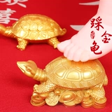 Годовой, хватаясь за Чжурной Черепах, памятный ребенок, наступающий на золотую черепаху тысячелетие китайского чистого ремесленного мастерства, чтобы поймать недельное украшение дня рождения